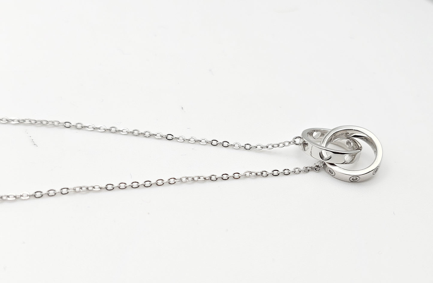 Dainty interlocked ring pendant , 925 Silver