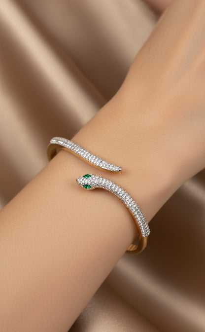 Serpentine Motif Bangle with green and white stone accents