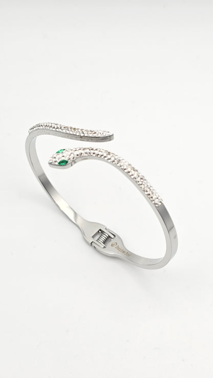 Serpentine Motif Bangle with green and white stone accents