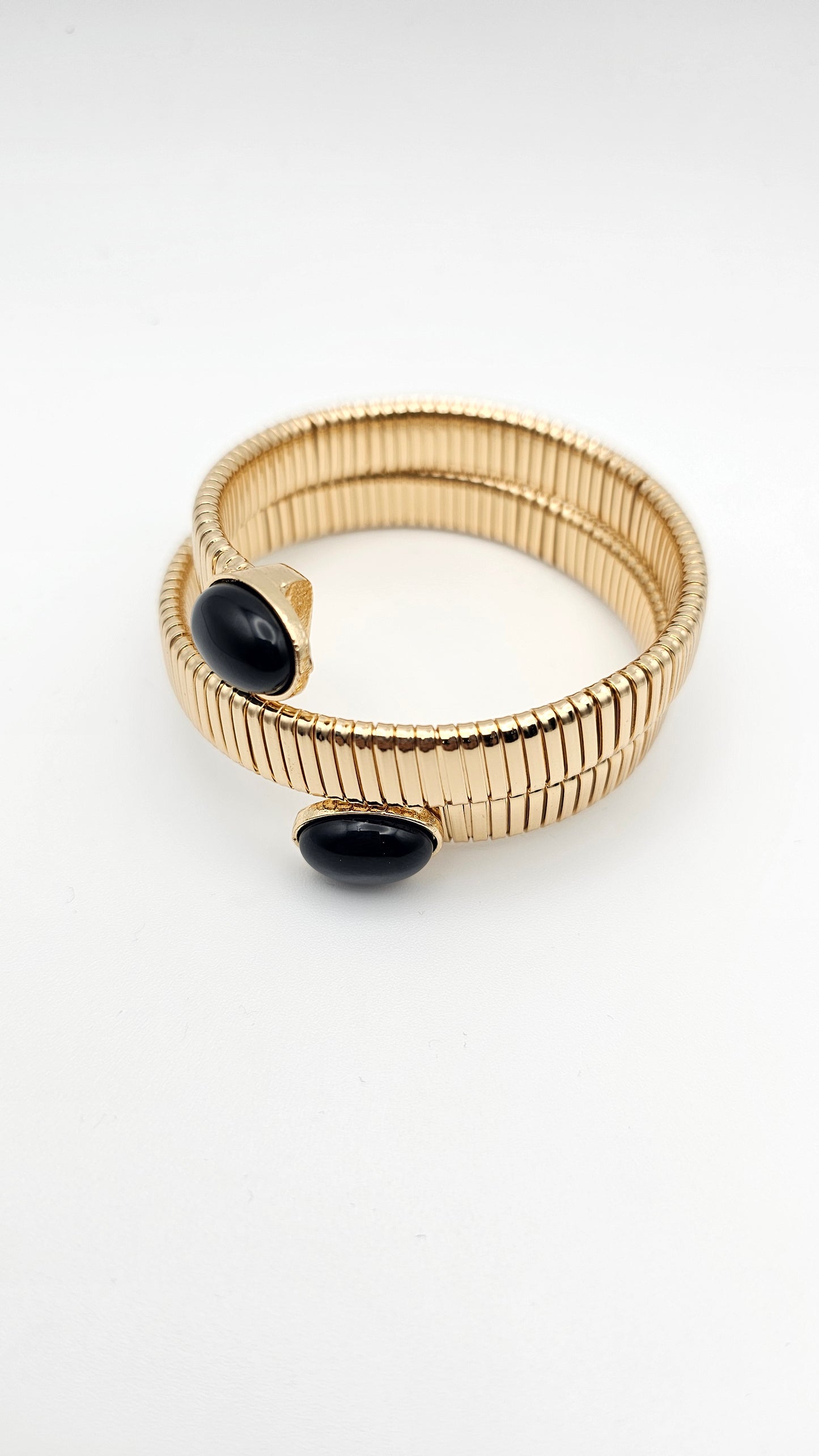 Spiral bangle with Black stone