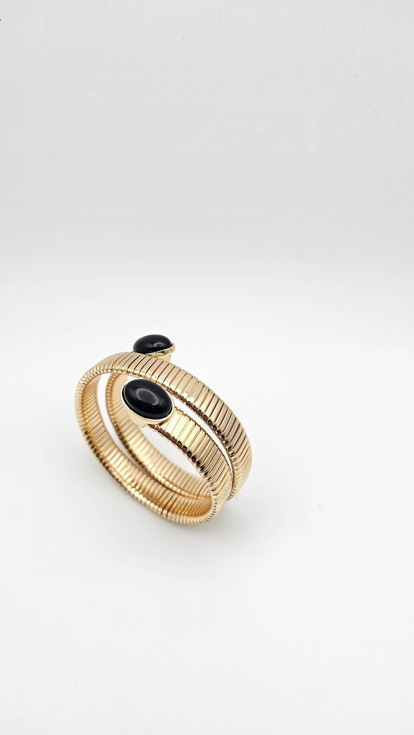 Spiral bangle with Black stone