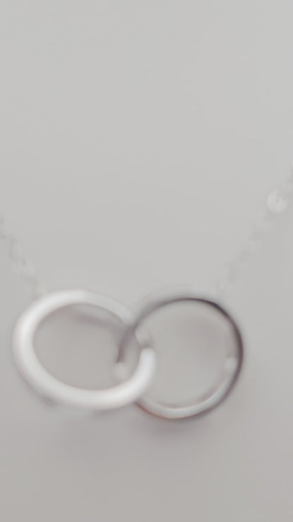 Dainty interlocked ring pendant , 925 Silver