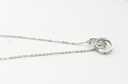 Dainty interlocked ring pendant , 925 Silver