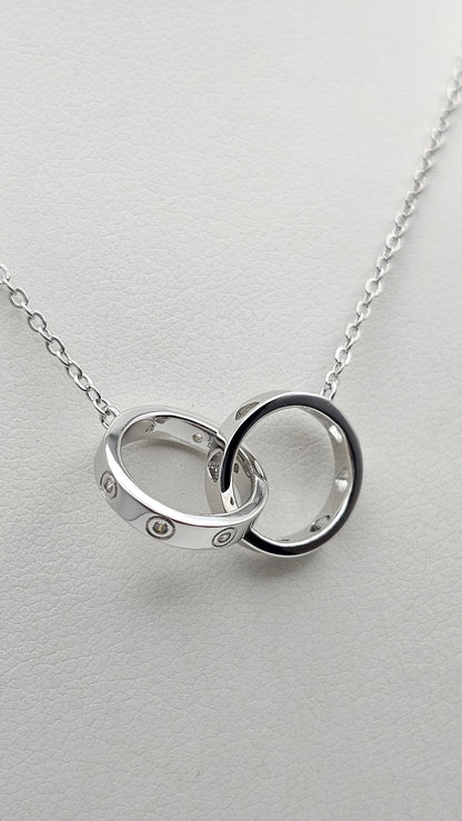 Dainty interlocked ring pendant , 925 Silver